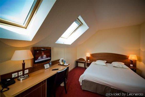 Ibis Styles Clermont-Ferrand Aeroport Hotel Værelse billede